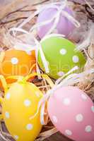 colorful easter egg decoration on wooden background