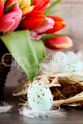 festive traditional easter egg decoration ribbon and tulips