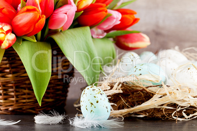 festive traditional easter egg decoration ribbon and tulips