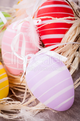 colorful easter egg decoration on wooden background