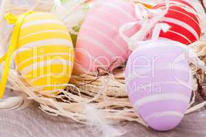 colorful easter egg decoration on wooden background