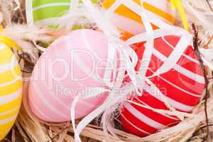 colorful easter egg decoration on wooden background