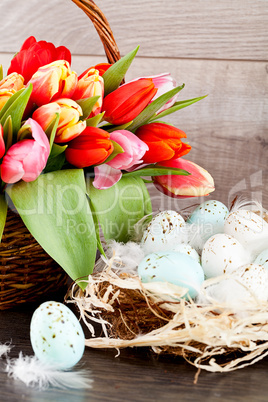 festive traditional easter egg decoration ribbon and tulips