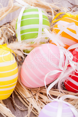 colorful easter egg decoration on wooden background