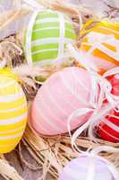 colorful easter egg decoration on wooden background