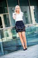 young business woman with mobile phone smartphone