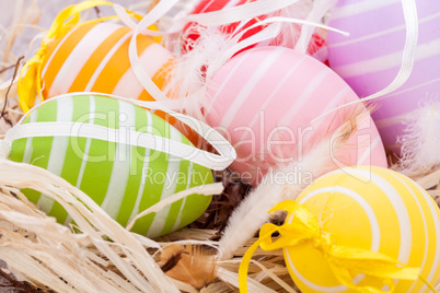 colorful easter egg decoration on wooden background