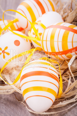 Decorative Easter eggs, on a rustic wooden table