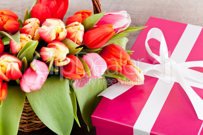 pink present and colorful tulips festive easter decoration