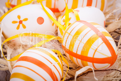 Decorative Easter eggs, on a rustic wooden table