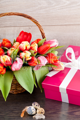 pink present and colorful tulips festive easter decoration