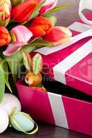 pink present and colorful tulips festive easter decoration
