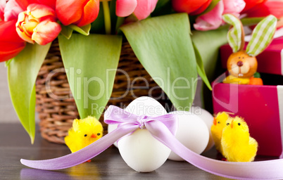 pink present and colorful tulips festive easter decoration