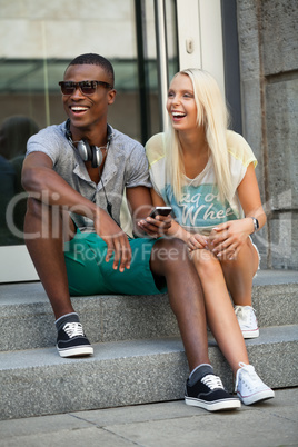 happy young couple have fun in the city summertime