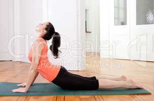 young attractive woman doing pilates