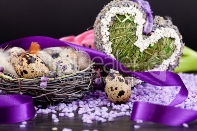 pink tulips and brown eggs with purple ribbon easter decoration