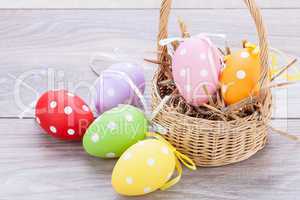 colorful easter egg decoration on wooden background