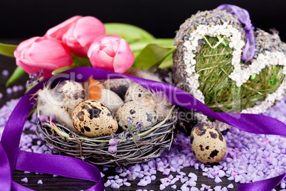 pink tulips and brown eggs with purple ribbon easter decoration