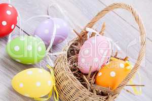 colorful easter egg decoration on wooden background