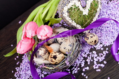 pink tulips and brown eggs with purple ribbon easter decoration