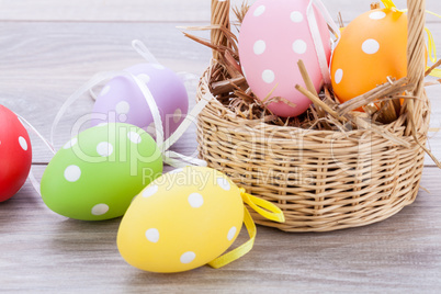 colorful easter egg decoration on wooden background