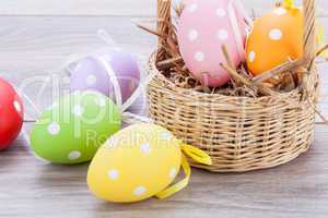 colorful easter egg decoration on wooden background