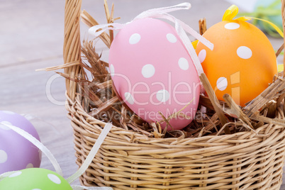 colorful easter egg decoration on wooden background