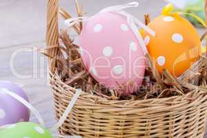 colorful easter egg decoration on wooden background