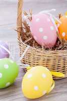 colorful easter egg decoration on wooden background