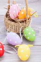 colorful easter egg decoration on wooden background