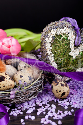 pink tulips and brown eggs with purple ribbon easter decoration