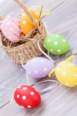 colorful easter egg decoration on wooden background