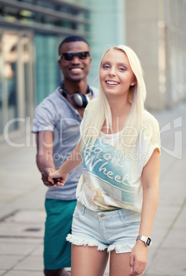 happy young couple have fun in the city summertime