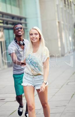 happy young couple have fun in the city summertime