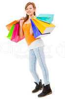 attractive young woman with colorful shopping bags