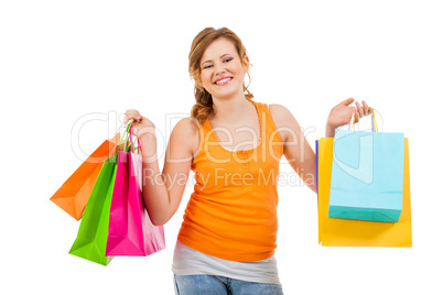 attractive young woman with colorful shopping bags