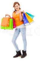 attractive young woman with colorful shopping bags