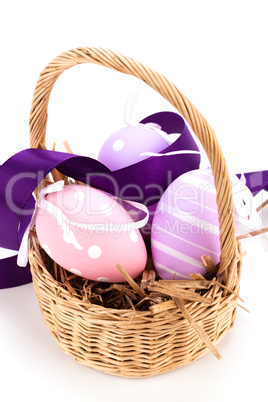 Straw basket with traditional Easter eggs