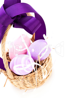Straw basket with traditional Easter eggs