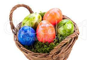 Basket of brightly coloured Easter Eggs