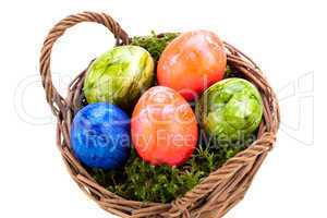 Basket of brightly coloured Easter Eggs