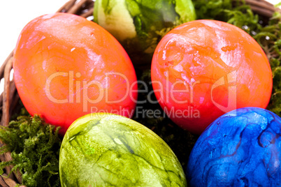 Basket of brightly coloured Easter Eggs