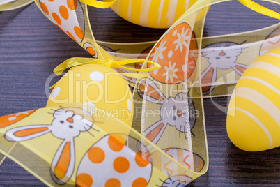 Decorative Easter eggs, on a rustic wooden table