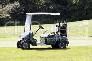 golf car on a course in summer