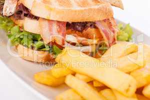 Club sandwich with potato French fries