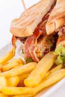 Club sandwich with potato French fries