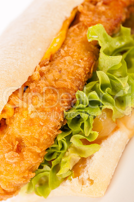 Burger with golden crumbed chicken breast