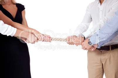 business woman against businessman pulling rope isolated