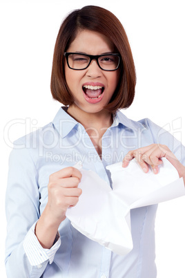 young frustrated asian business woman with paperwork crumpled