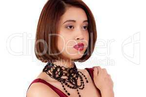 young attractive asian woman with red lips and jewelry isolated